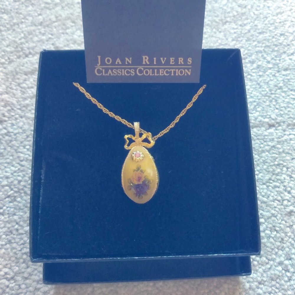 NIB Goldtone painted caged egg with crystal accent